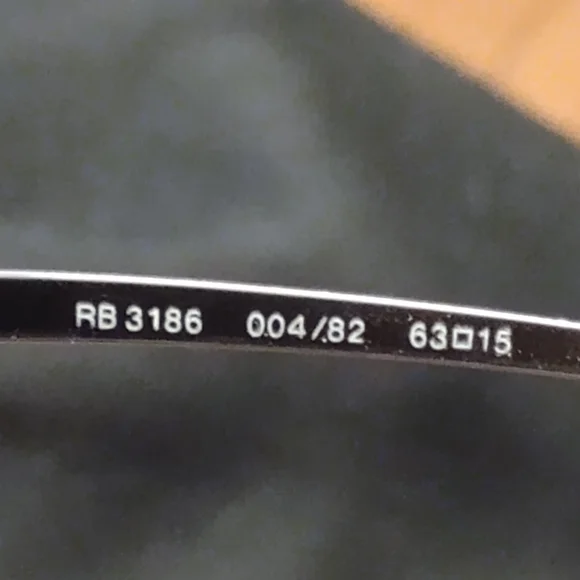 RAY BAN ITALY RB3186 63[]15 014/73 SLEEK BROWN HALF RIMLESS WRAP